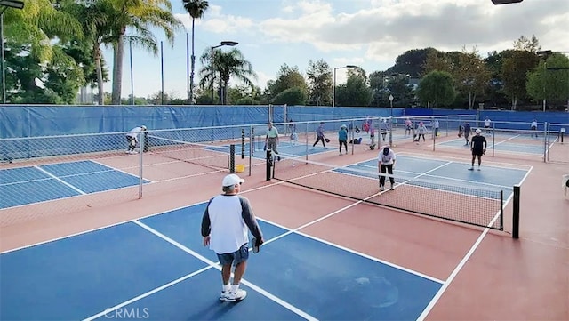 834UnitP Ronda Mendoza, Laguna Woods, CA 92637 - view of tennis court with community basketball court