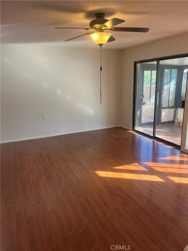 834UnitP Ronda Mendoza, Laguna Woods, CA 92637 - spare room with wood finished floors, a ceiling fan, and a textured ceiling