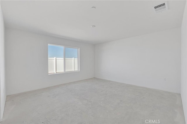 10132 Kemper Ave, Adelanto, CA 92301 - spare room with concrete floors