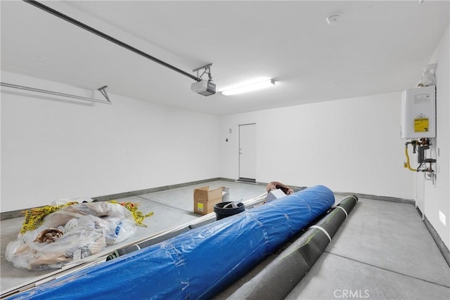 10132 Kemper Ave, Adelanto, CA 92301 - garage with tankless water heater and a garage door opener