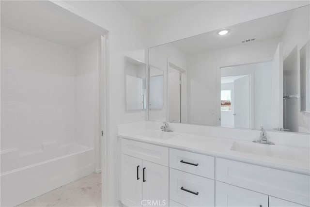 10132 Kemper Ave, Adelanto, CA 92301 - full bathroom featuring double vanity