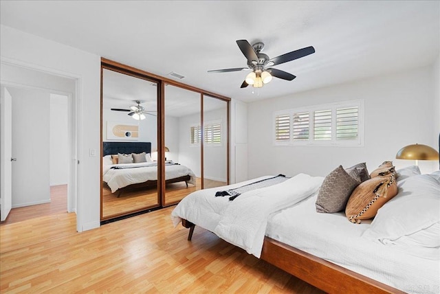 8149 Calico St, San Diego, CA 92126 - bedroom featuring light wood-type flooring, a closet, and ceiling fan