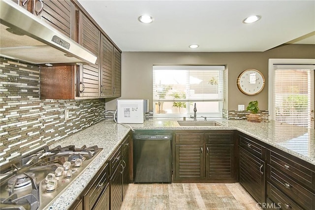 19 Las Cruces, Irvine, CA 92614 - kitchen featuring black dishwasher, extractor fan, stainless steel gas cooktop, plenty of natural light, and recessed lighting