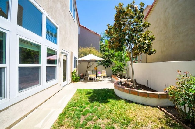 19 Las Cruces, Irvine, CA 92614 - view of yard featuring a patio