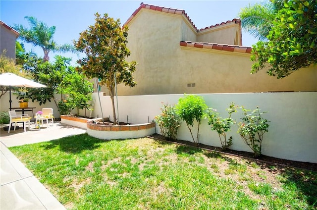 19 Las Cruces, Irvine, CA 92614 - view of yard featuring a patio area
