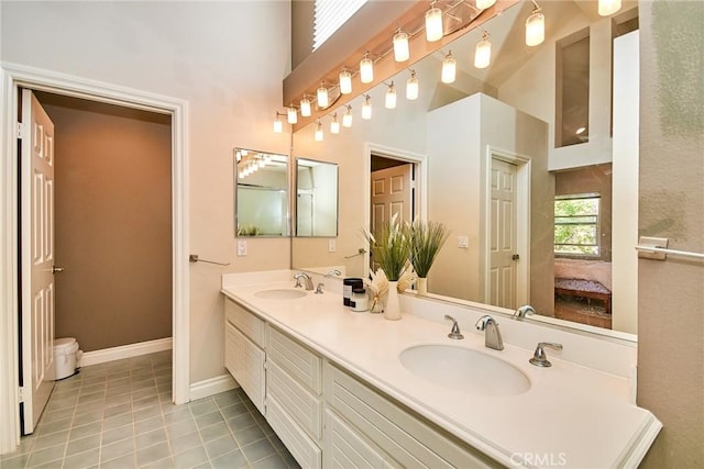 19 Las Cruces, Irvine, CA 92614 - ensuite bathroom with tile patterned floors, a high ceiling, and double vanity