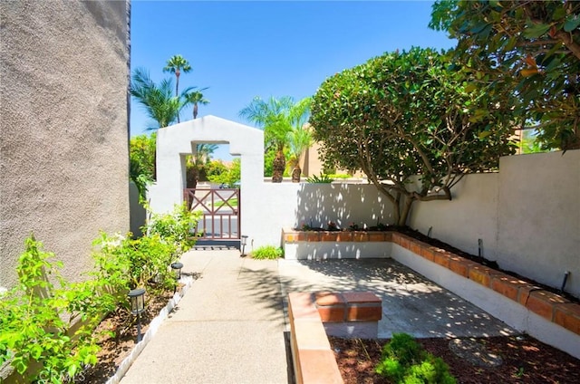 19 Las Cruces, Irvine, CA 92614 - view of yard with a gate and a patio area