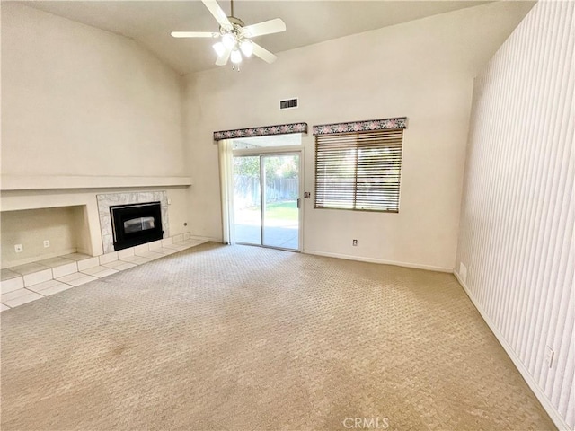 224 Stonewood Dr, Los Banos, CA 93635 - unfurnished living room featuring carpet, a fireplace, a ceiling fan, and high vaulted ceiling