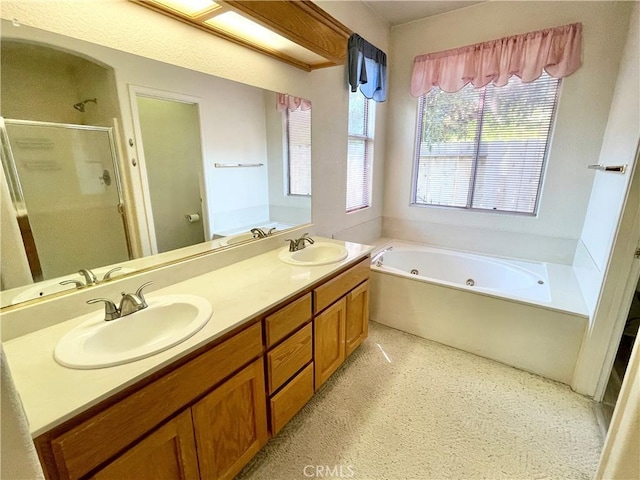224 Stonewood Dr, Los Banos, CA 93635 - bathroom with a stall shower, a jetted tub, and double vanity