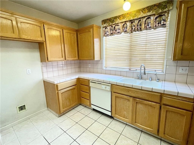 224 Stonewood Dr, Los Banos, CA 93635 - kitchen featuring dishwasher, backsplash, light tile patterned floors, and tile counters