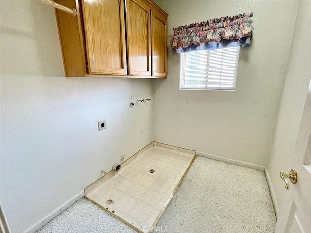 224 Stonewood Dr, Los Banos, CA 93635 - washroom featuring electric dryer hookup, cabinet space, hookup for a gas dryer, and washer hookup