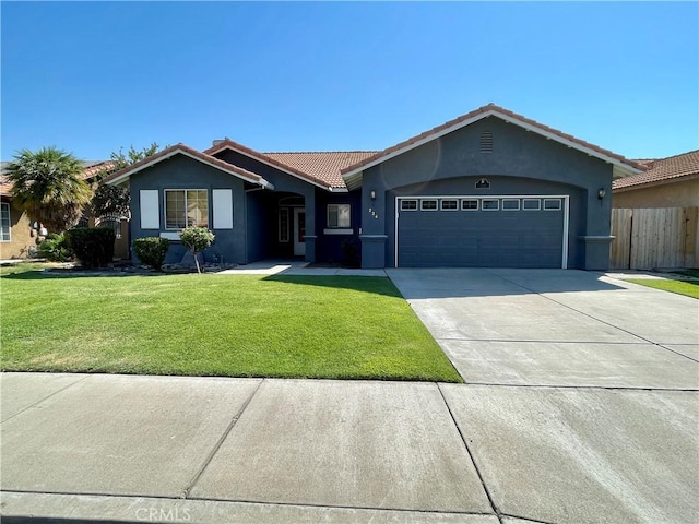 224 Stonewood Dr, Los Banos, CA 93635 - ranch-style house with an attached garage, a tiled roof, concrete driveway, and stucco siding