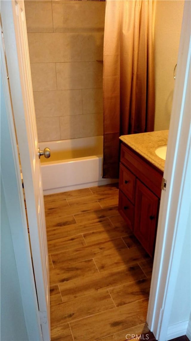 545 Chestnut Ave Unit 207, Long Beach, CA 90802 - full bath featuring vanity, wood finished floors, and shower / tub combo with curtain