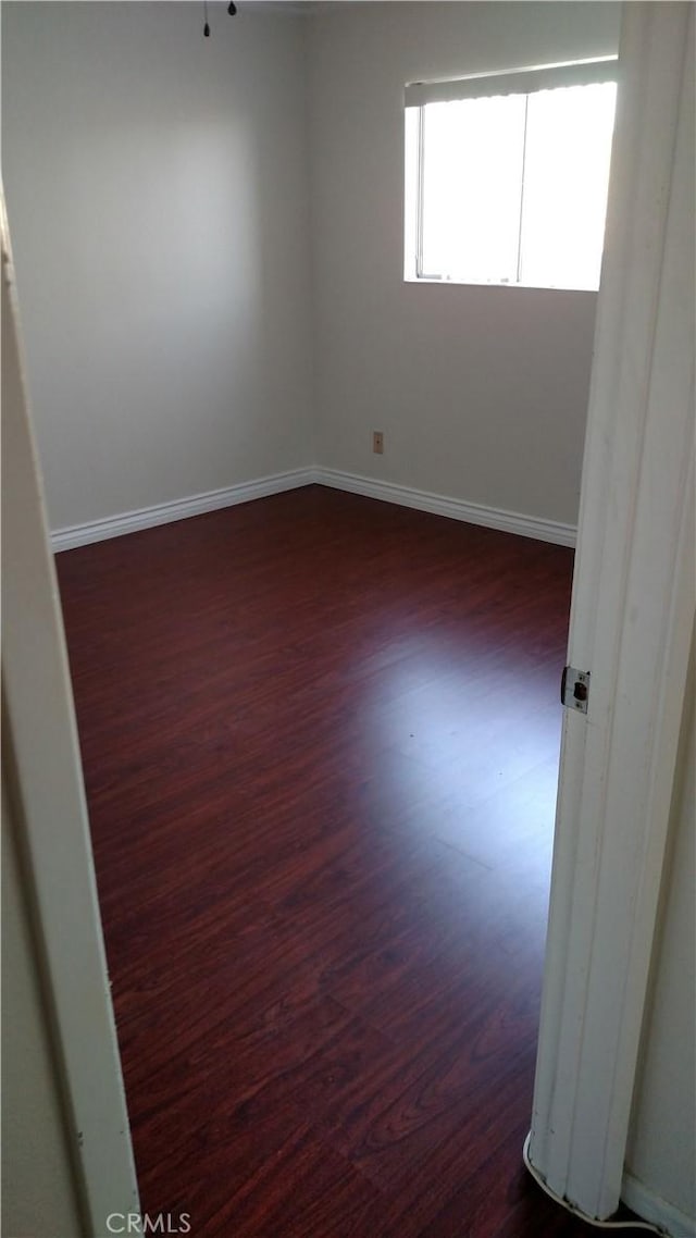 545 Chestnut Ave Unit 207, Long Beach, CA 90802 - spare room featuring dark wood-type flooring