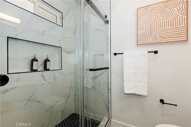 15615 Erie Rd, Apple Valley, CA 92307 - bathroom featuring a marble finish shower and toilet