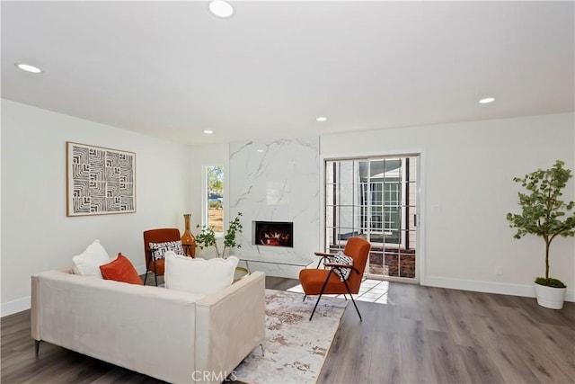 15615 Erie Rd, Apple Valley, CA 92307 - living room featuring wood finished floors, recessed lighting, and a high end fireplace