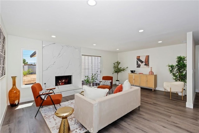 15615 Erie Rd, Apple Valley, CA 92307 - living room with recessed lighting, wood finished floors, and a premium fireplace