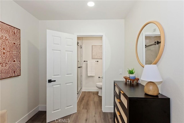 15615 Erie Rd, Apple Valley, CA 92307 - corridor featuring wood finished floors and recessed lighting