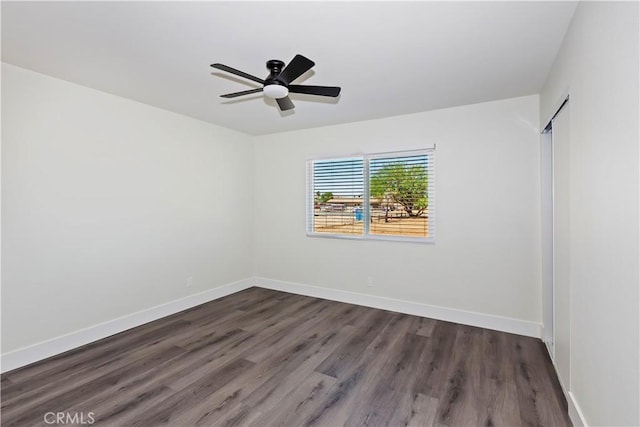 15615 Erie Rd, Apple Valley, CA 92307 - empty room with dark wood-type flooring and a ceiling fan