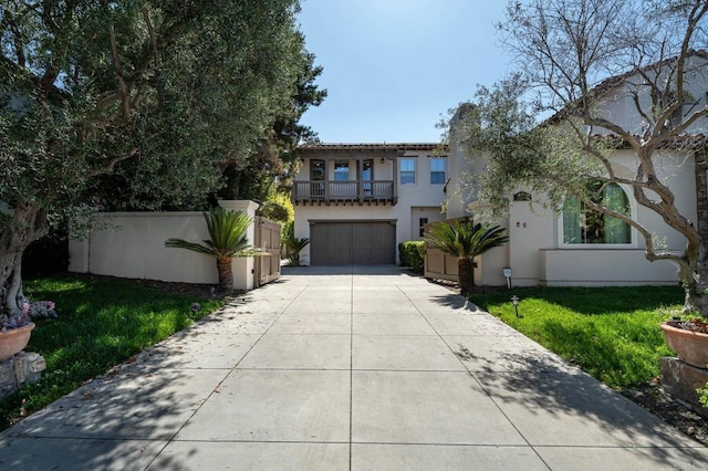 7425 Rancho Cabrillo Trl, San Diego, CA 92127 - mediterranean / spanish-style home featuring driveway, a balcony, stucco siding, an attached garage, and a front yard