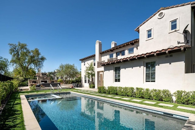7425 Rancho Cabrillo Trl, San Diego, CA 92127 - view of swimming pool with an outdoor fireplace, a pool with connected hot tub, and a patio
