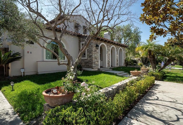 7425 Rancho Cabrillo Trl, San Diego, CA 92127 - view of front of home featuring a chimney, a front yard, stucco siding, and stone siding