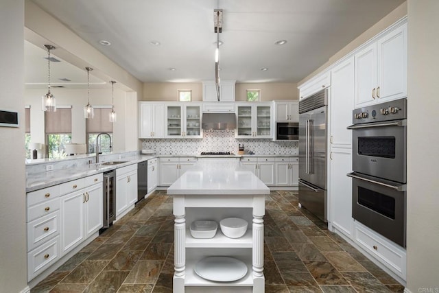 7425 Rancho Cabrillo Trl, San Diego, CA 92127 - kitchen with built in appliances, open shelves, stone tile flooring, beverage cooler, and white cabinetry