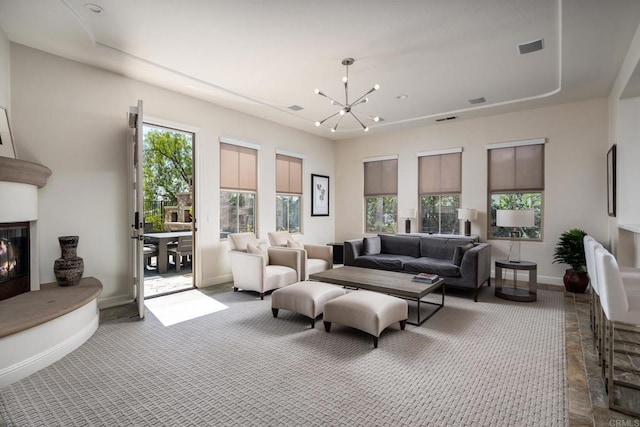 7425 Rancho Cabrillo Trl, San Diego, CA 92127 - carpeted living area featuring a fireplace and a chandelier