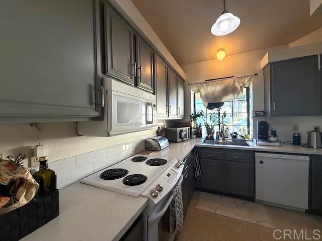 911 Concord Ct, Vista, CA 92081 - kitchen featuring white appliances, light countertops, and gray cabinetry