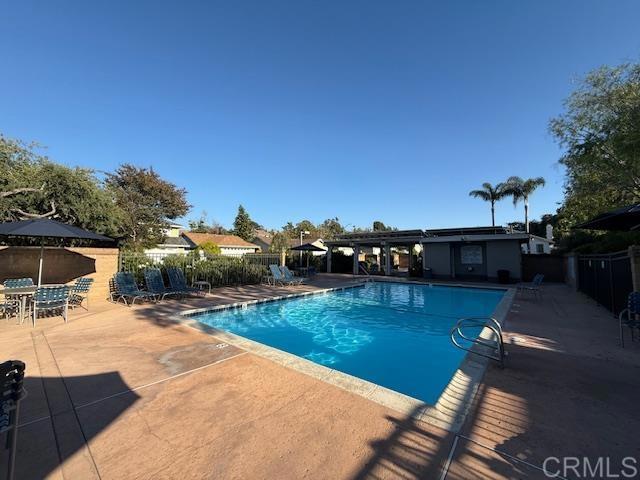 911 Concord Ct, Vista, CA 92081 - community pool with a patio area