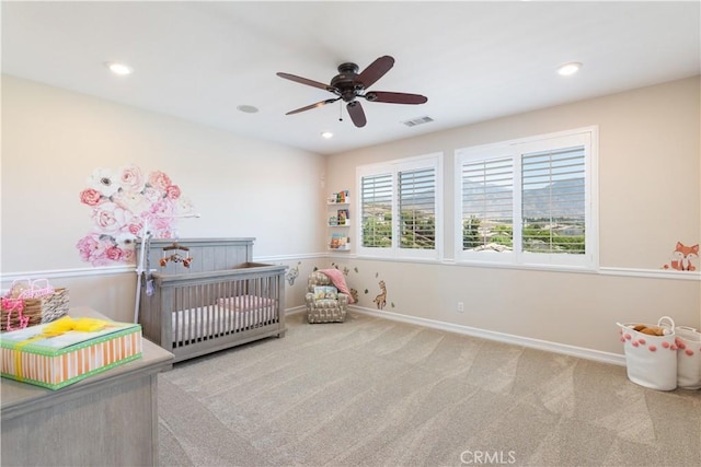 11645 Wiggins Ct, Yucaipa, CA 92399 - carpeted bedroom with a crib and recessed lighting