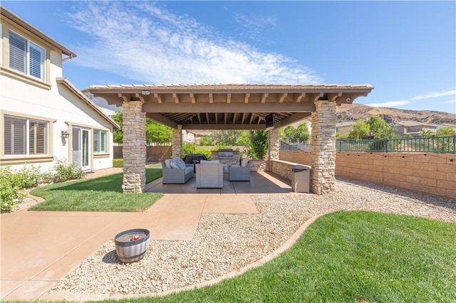 11645 Wiggins Ct, Yucaipa, CA 92399 - fenced backyard featuring an outdoor living space and a patio