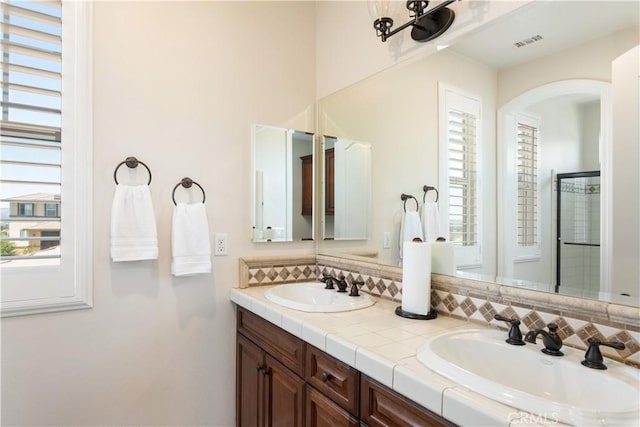 11645 Wiggins Ct, Yucaipa, CA 92399 - bathroom with double vanity and backsplash