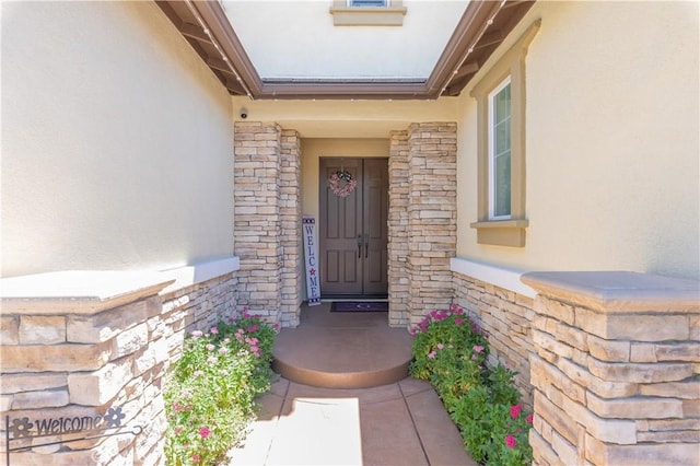 11645 Wiggins Ct, Yucaipa, CA 92399 - entrance to property with stucco siding and stone siding