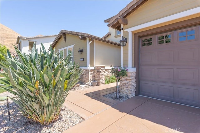 11645 Wiggins Ct, Yucaipa, CA 92399 - entrance to property featuring stone siding and stucco siding