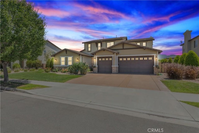 11645 Wiggins Ct, Yucaipa, CA 92399 - view of front of home with concrete driveway, an attached garage, a lawn, and stone siding