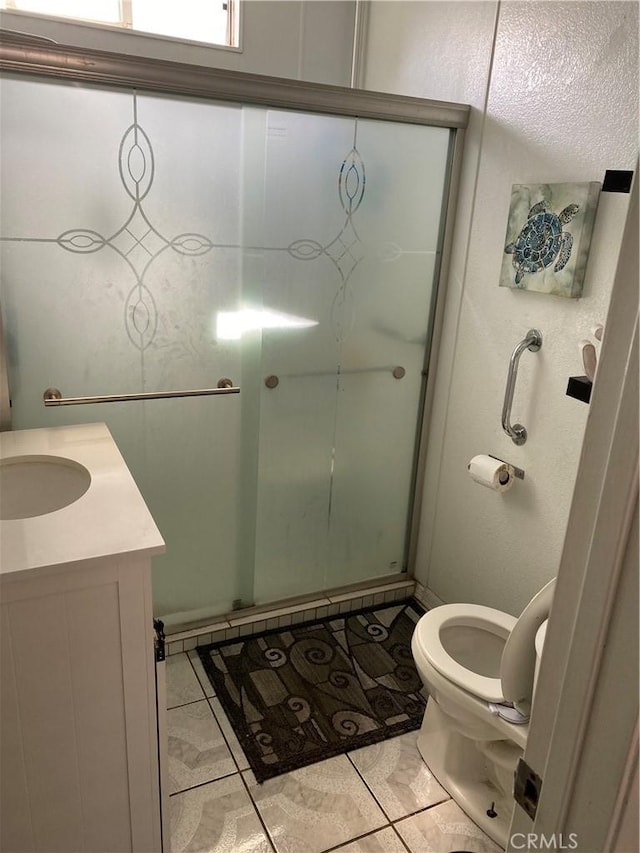 427 W 92nd St, Los Angeles, CA 90003 - bathroom with vanity and a shower with shower door