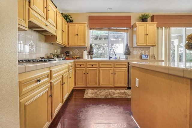 57 Mountain Laurel Way, Azusa, CA 91702 - kitchen with tile countertops, stainless steel gas stovetop, dark wood finished floors, and decorative backsplash