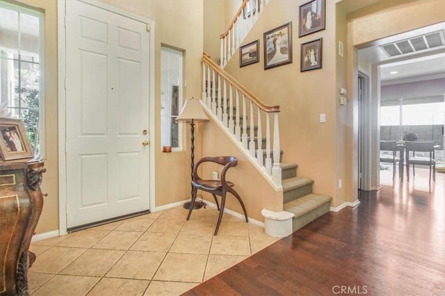 57 Mountain Laurel Way, Azusa, CA 91702 - foyer entrance featuring stairway and light wood-type flooring