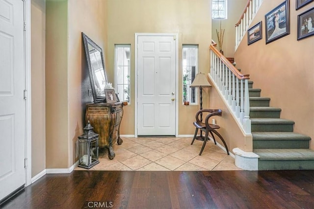 57 Mountain Laurel Way, Azusa, CA 91702 - entrance foyer with a high ceiling, stairway, and wood finished floors