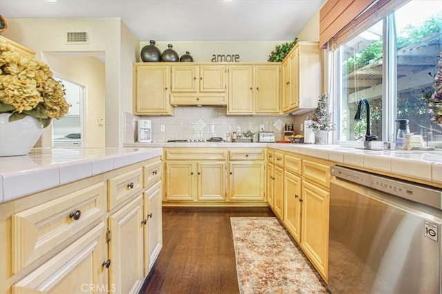 57 Mountain Laurel Way, Azusa, CA 91702 - kitchen featuring appliances with stainless steel finishes, tile countertops, tasteful backsplash, and dark wood finished floors