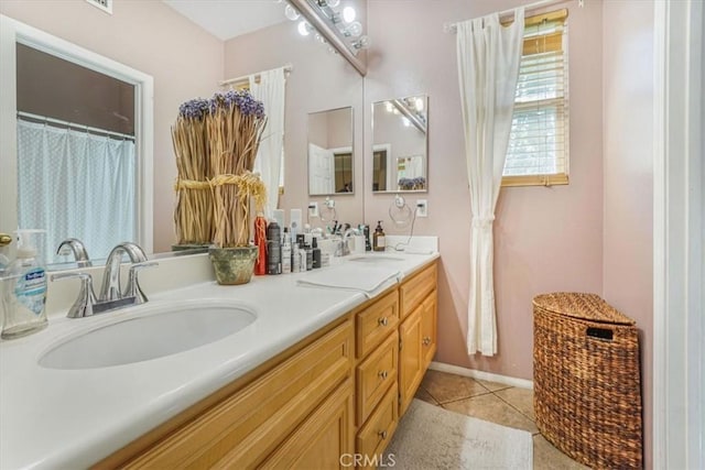 57 Mountain Laurel Way, Azusa, CA 91702 - full bath with double vanity and tile patterned flooring