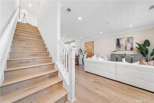 2437 Sanabria Ln, Brea, CA 92821 - stairway with ornamental molding, recessed lighting, and wood finished floors