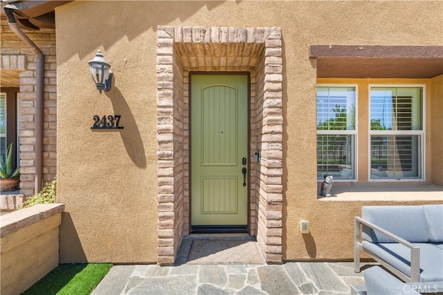 2437 Sanabria Ln, Brea, CA 92821 - property entrance featuring stucco siding