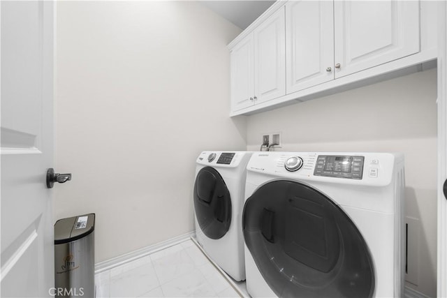 2437 Sanabria Ln, Brea, CA 92821 - laundry room with washing machine and dryer, cabinet space, and light marble finish flooring