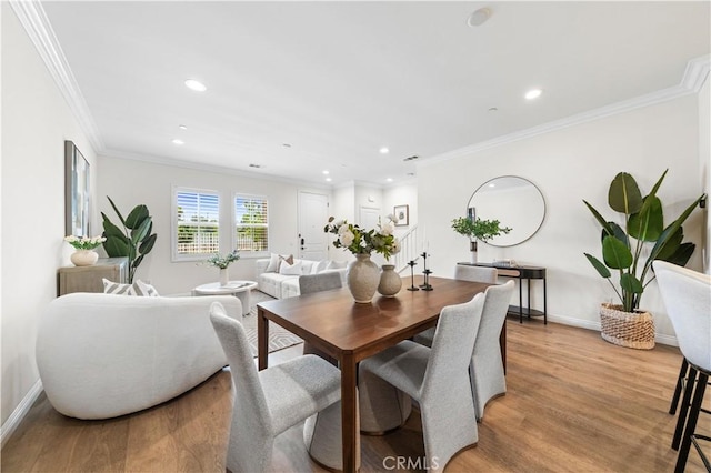 2437 Sanabria Ln, Brea, CA 92821 - dining room featuring light wood-style floors, recessed lighting, and ornamental molding