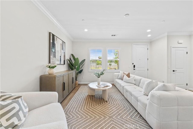 2437 Sanabria Ln, Brea, CA 92821 - living area with light wood finished floors, recessed lighting, and crown molding