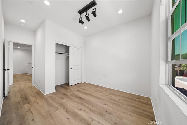 2437 Sanabria Ln, Brea, CA 92821 - unfurnished bedroom featuring recessed lighting, light wood-type flooring, and a closet