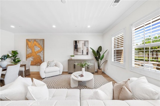 2437 Sanabria Ln, Brea, CA 92821 - living area featuring light wood finished floors, recessed lighting, and crown molding