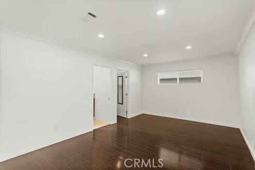 4775 Beverly Ct, Riverside, CA 92506 - empty room with wood finished floors, recessed lighting, and crown molding